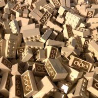 Closeup photo of lots of 2x4 tan LEGO bricks